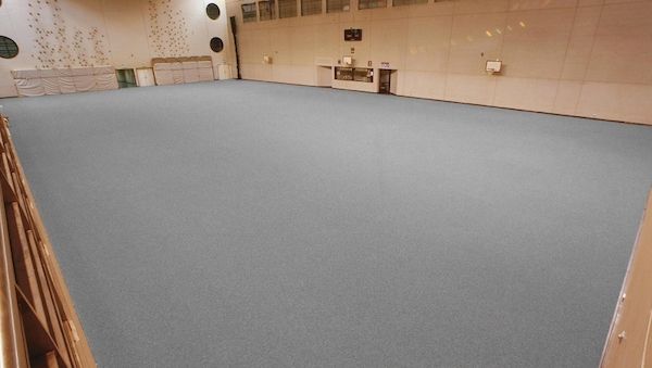 "Schützen Sie Ihren teuren Turn- und Sporthallenboden für Events mit Concord Teppichfliesen".
